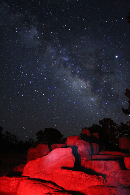 Milky Way photo with rocks in foreground