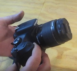 A canon camera and lens