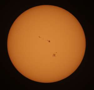A photo  of the sun with sunspots