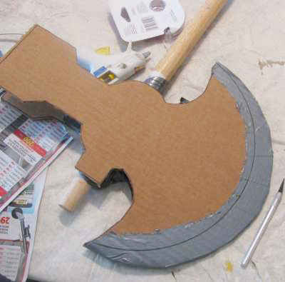 Tape or glue the blade edges together