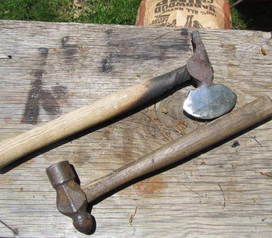 Use an old hammer to forge a hatchet
