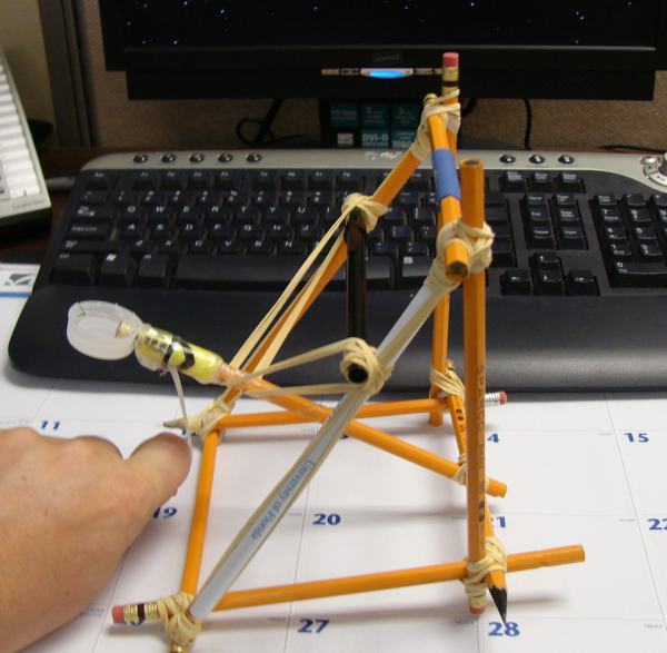 simple catapult design. The catapult is cocked and