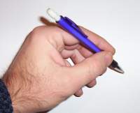 holding the pencil in the traditional way