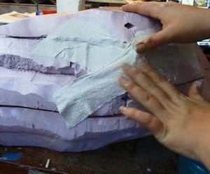 Plaster or paper mache the edges