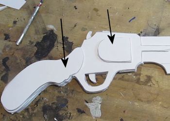Glue on the grip and the revolver chamber