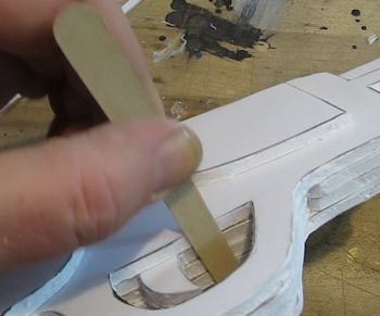 Do detail sanding with an emory board