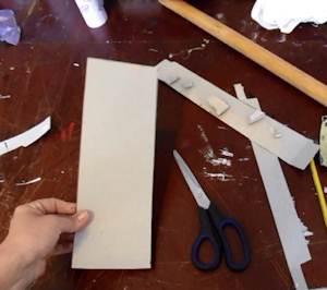 Cut a strip of cardboard