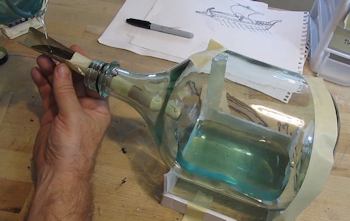 Pour resin into bottle