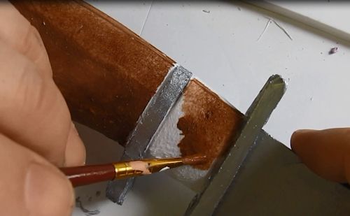 Paint the handle brown