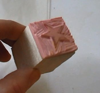 Mount stamp to a block