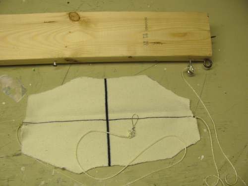 Make and attach the string pouch