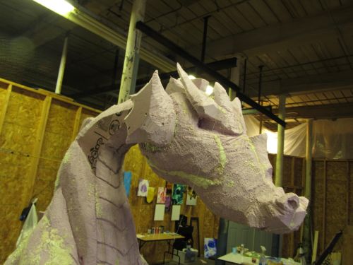 More detail work on the head and neck of the foam dragon