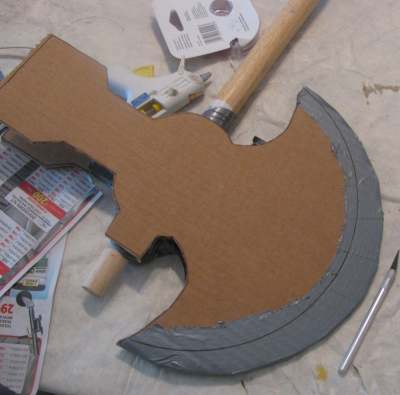 Tape or glue the blade edges together