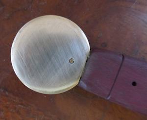 Brass pommel