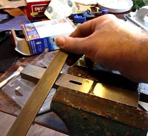 File the shape of the handle