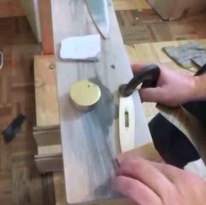 Polishing the guard and pommel