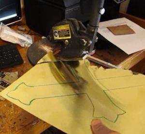 Cut out the brass shape