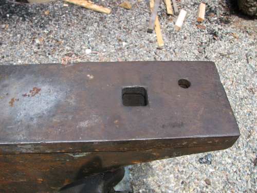 Hardie hole in anvil