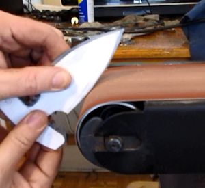 Grind the shape on a belt sander