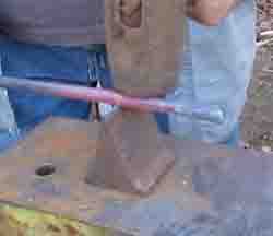 Using a hardy cut off tool