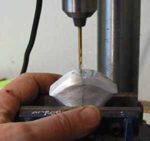 Drill the pommel