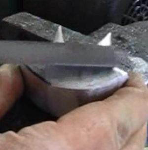 Filing the pommel