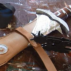 Punch hole in strap