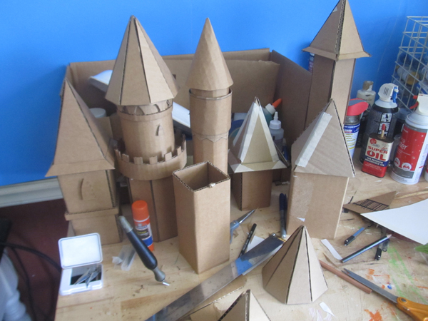 Teting the shapes and sizes of cardboard towers