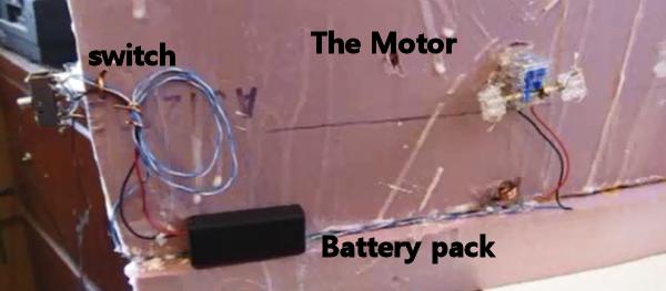 The motor setup on back of wall