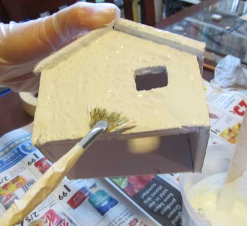 Applying plaster to the building