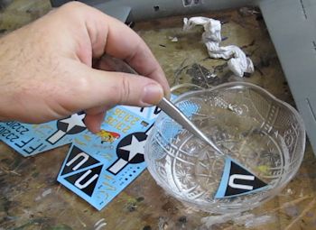Soak decal in water