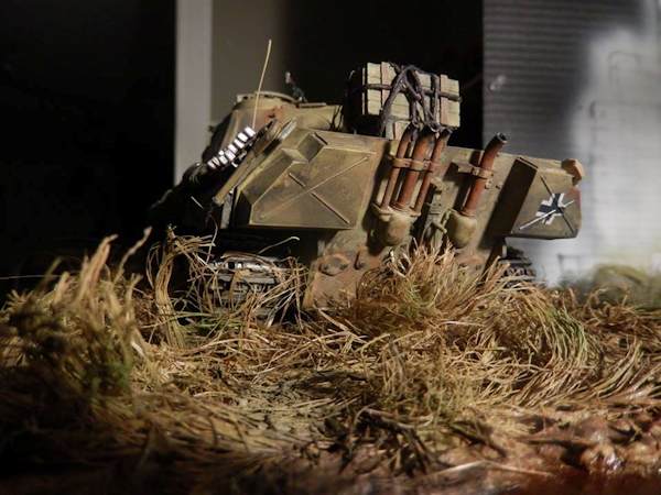 Tank viewed through the tall grass