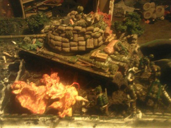 The tank, fire and figures