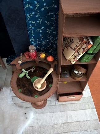 The alchemy table and bookshelf