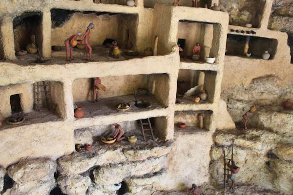 A diorama of a native american pueblo