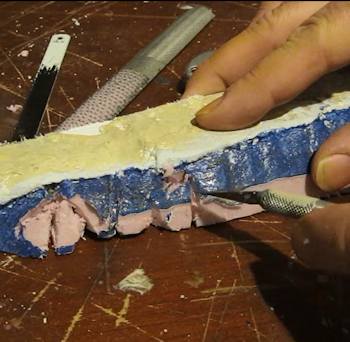 Carving the stones of the bank 