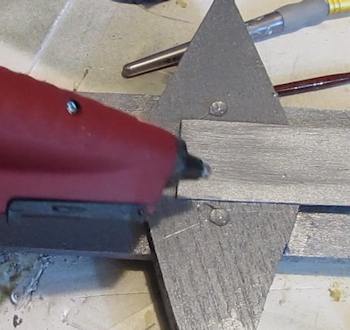 Add hot glue rivets