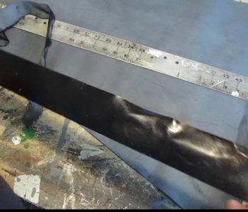 Cut a strap from cloth or vinyl