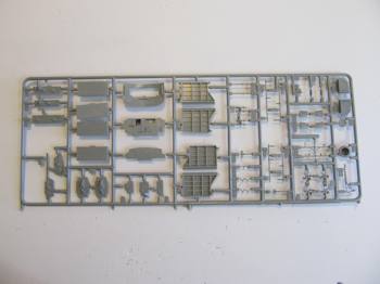 A sprue with plastic parts