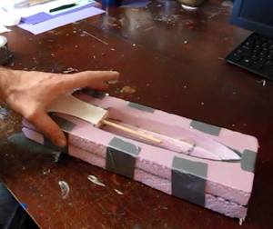 Tape the halves together