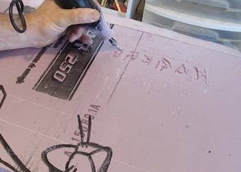 Add the runes with a dremel