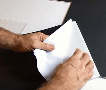Peel the paper off both sides