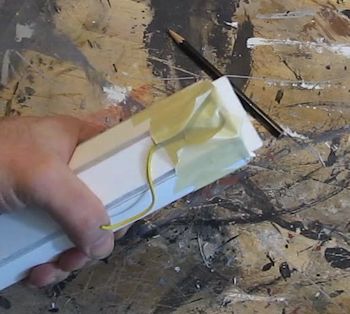Tape rubber band to test