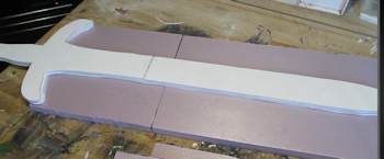 Lay sword on layer