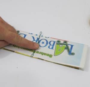 Wrap newspaper around wire