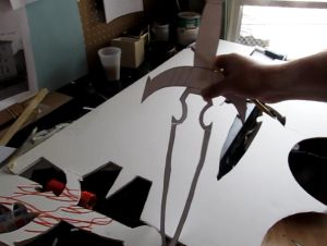 Cutting out center pieces of template.