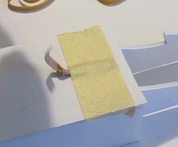 Tape down rubber band