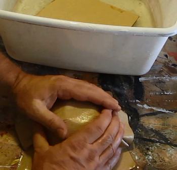 Form cardboard over the bowl