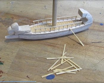 Continue assembly of ship