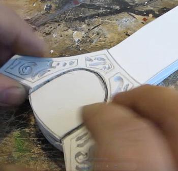 Glue the pommel pieces on 